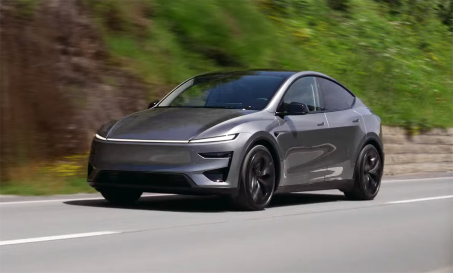 Tesla Model Y in quicksilver on the road