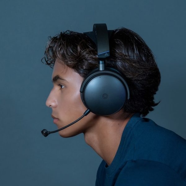 Man wearing Audeze Maxwell 2 Gaming Headset Side Lifestyle