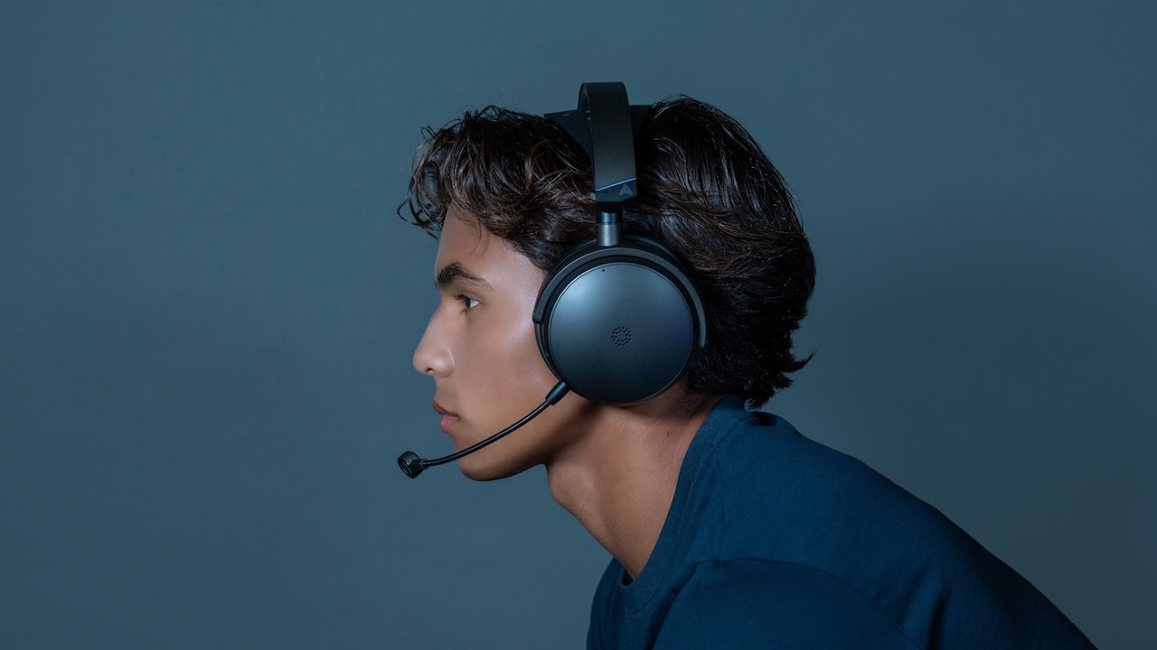 Man wearing Audeze Maxwell 2 Gaming Headset Side Lifestyle