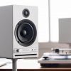 Audioengine HD4 Next Gen Wireless Speakers White on stands lifestyle no grilles