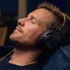 Man wearing Baum Audio Ellipse Over-ear Wired Headphones