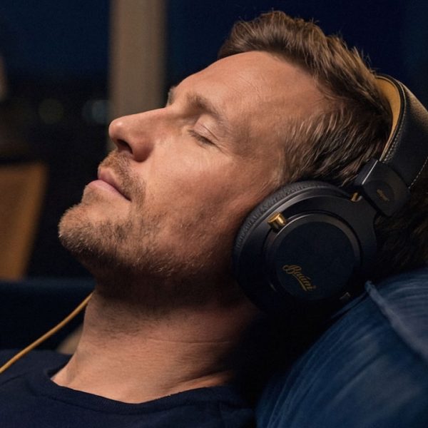 Man wearing Baum Audio Ellipse Over-ear Wired Headphones