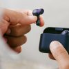 2026 Cambridge Audio Melomania A100 SE Wireless Earbuds in hand Blue