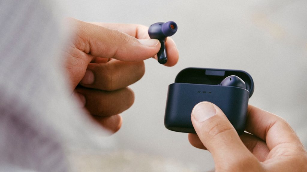 2026 Cambridge Audio Melomania A100 SE Wireless Earbuds in hand Blue