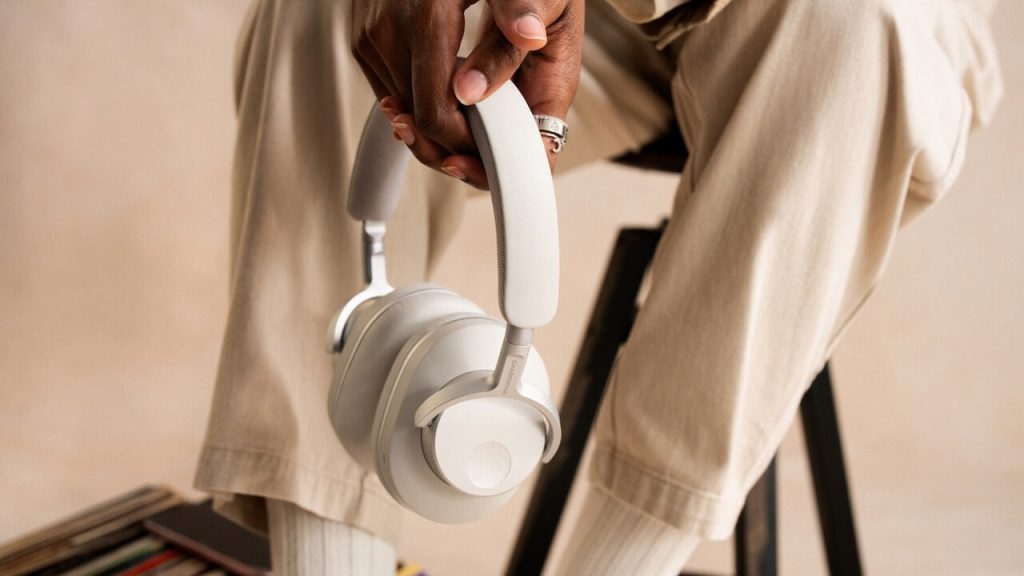 Cambridge Audio Melomania P100 SE White Headphones in hand