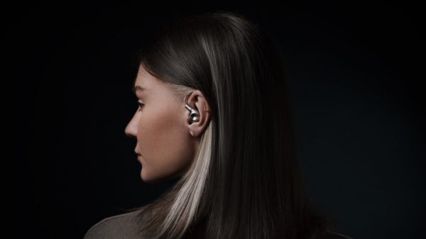 Woman wearing Meze Audio Astru IEM in-ear