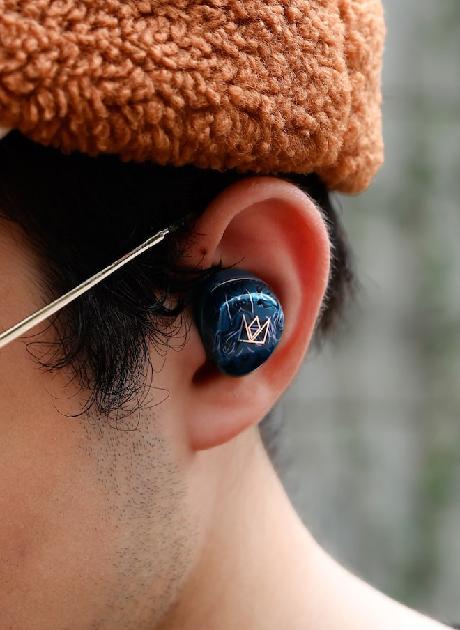 noble-osprey-wireless-earbuds-lifestyle-side-angle