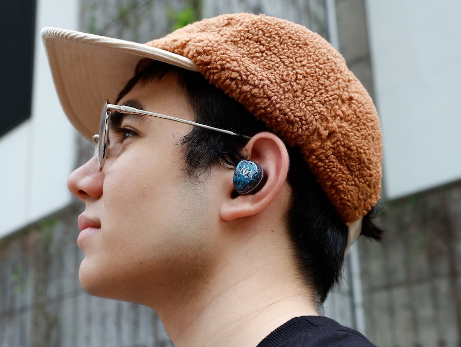 noble-osprey-wireless-earbuds-lifestyle-side