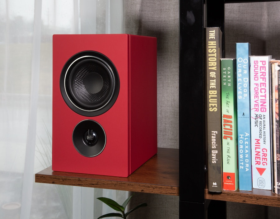 psb-iq2-speaker-on-shelf-red-lifestyle