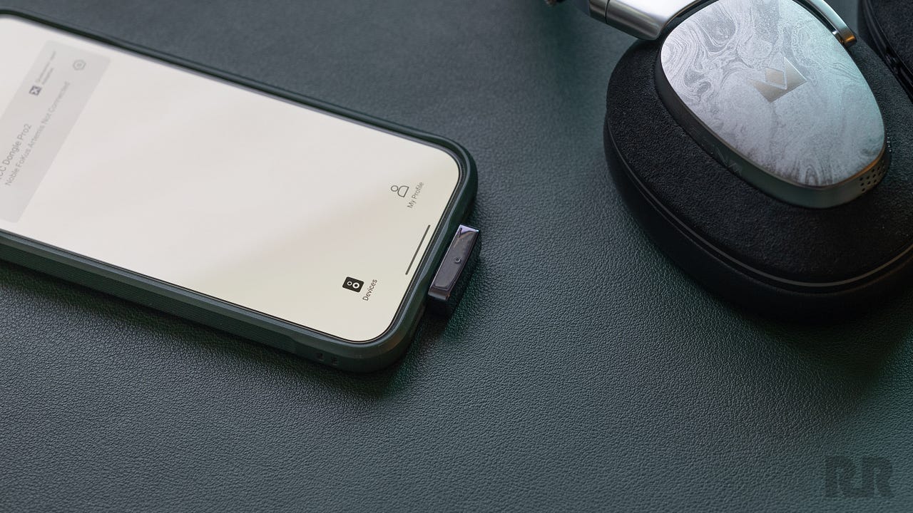 2026 Questyle QCC Dongle Pro2 USB-C wireless adapter connected to smartphone