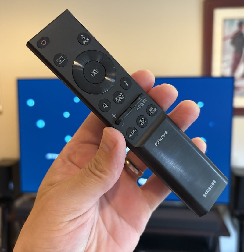 Remote Control in hand for 2026 Samsung HW-QS90H soundbar