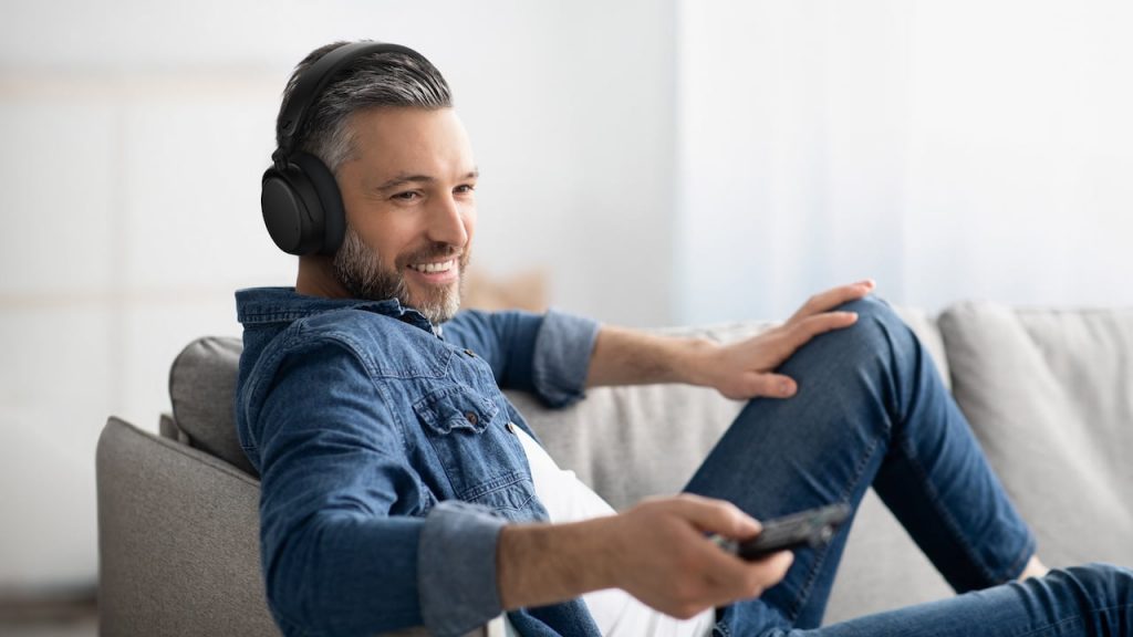Man wearing Sennheiser RS 275 TV Listening Bundle Headphones