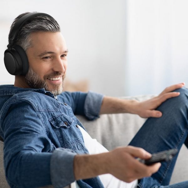 Man wearing Sennheiser RS 275 TV Listening Bundle Headphones