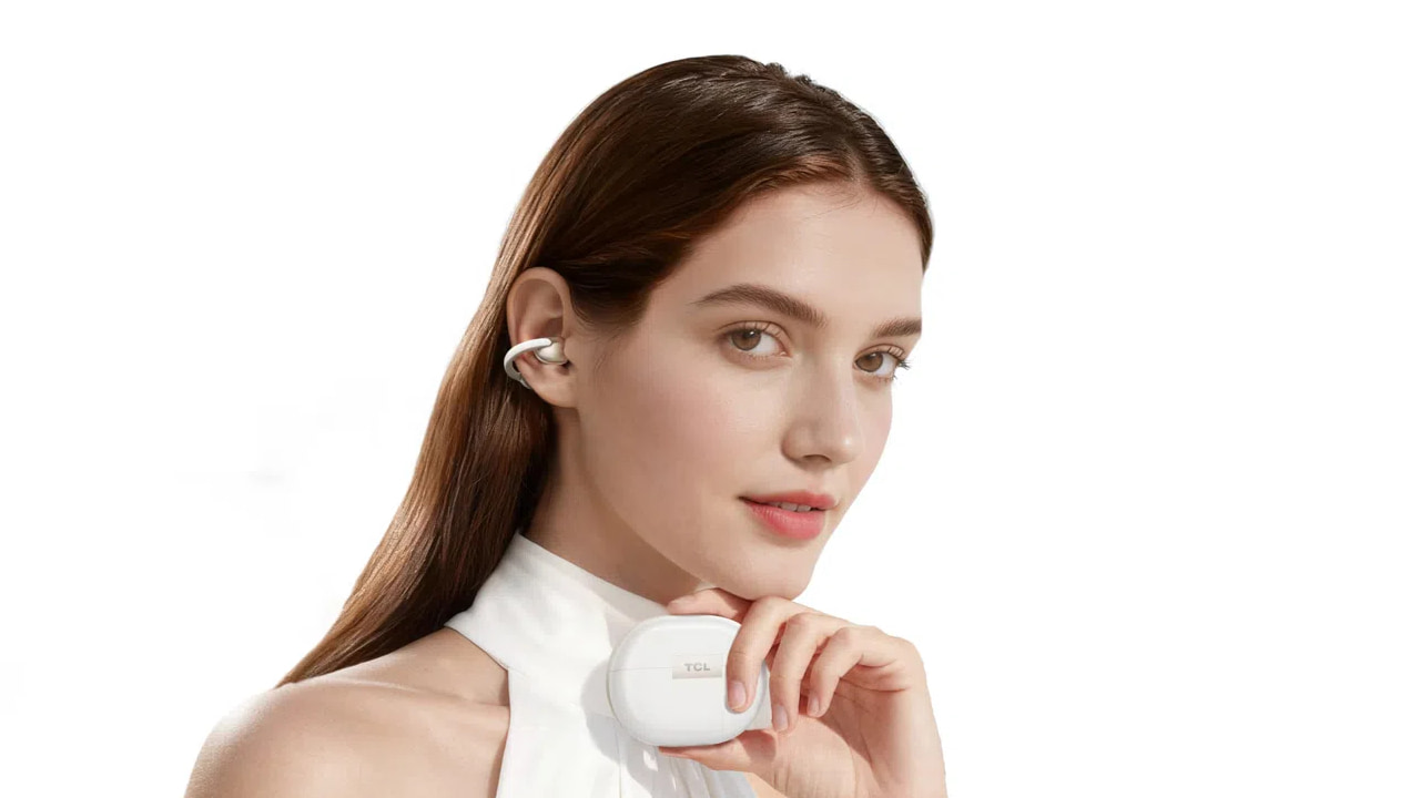 TCL CrystalClip Open-ear Wireless Earbuds Lifestyle Woman Holding White Charging Case